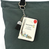 COMECO INC - WINNIE THE POOH BOOK BAG CHARM COIN PURSE IN VINYL