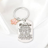 Keychain with sentimental message to a best friend on a white background