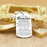 Keychain with a tag reading 'To my Bestie' on a gold background