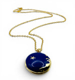 Gold necklace with a blue pendant featuring a star design on a white background. Blue Enamel Locket .