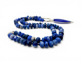 Blue beaded necklace with a silver clasp on a white background. Blue Peruvian Opal Necklace.