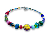 Colorful beaded necklace on a white background