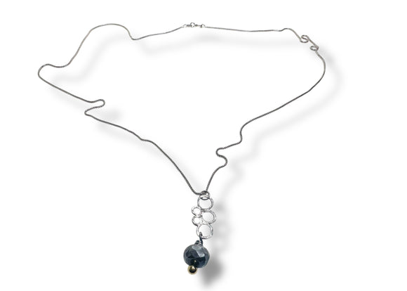 Necklace with a dark bead on a white background bubble necklace 