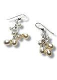 Pearl earrings on a white background
