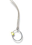 Necklace with a heart-shaped pendant on a white background