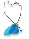 Dream Sea Glass Necklace -seaglass necklace in blue with dream etched onto it and a sterling dolphin charm