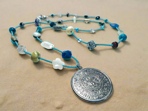 Long Gemstone and Myan Calendar Inspired Pendant