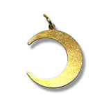 Gold crescent moon pendant on a white background