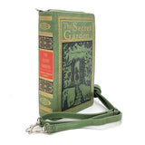 Green book-shaped purse with 'The Secret Garden' design on a white background