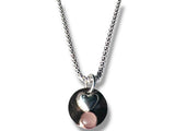 Necklace with a heart and pink stone pendant on a white background