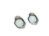 Hexagonal opal earrings on a white background