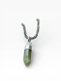 Silver necklace with a green crystal pendant on a white background. Labradorite Point Necklace