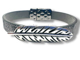 Silver feather design bracelet on a white background