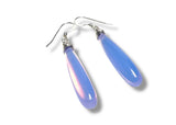Pair of blue teardrop earrings on a white background