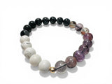 Multicolored beaded bracelet on a white background