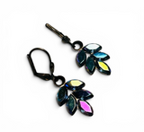 Multicolored leaf-shaped earrings on a white background