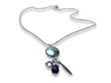 Necklace with Coin pearl pendant, feather and amethyst charm pendant on a white background