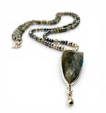 Necklace with Labradorite pendant on a white background