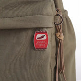 Neuro Spicy badge attached to a brown bag