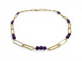 Gold necklace with purple beads on a white background. Paperclip Chain Amethyst Necklace.