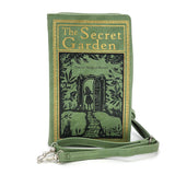 Green book-shaped purse with 'The Secret Garden' design on a white background