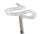 Necklace with a Silver Bar pendant featuring gemstones on a white background