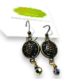 Turtle Earrings -brass stamping in brass circle with blue crystals.