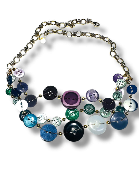 Necklace with colorful button-like beads on a white background