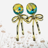 Polymer Clay Earrings/ clay blue disk with gold bow charms 