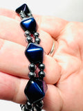 Double Gemstone Stretch Bracelet - glass black and blue studs and hematite beads