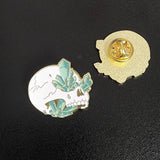 Skeleton and Green Crystal Clusters Enamel Pin - Janine Design