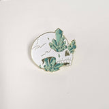 Skeleton and Green Crystal Clusters Enamel Pin - Janine Design