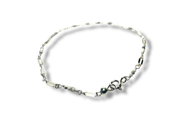 Bracelet with howlite beads on a white background
