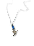 Necklace with a hummingbird pendant on a white background