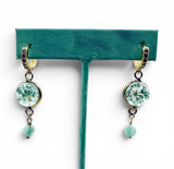 larimar and flower earrings close up