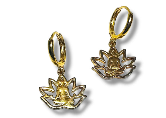 Gold lotus flower earrings on a white background