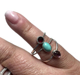Oval Tourmaline Ring -with other complimentary rings on a finger