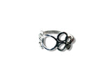 Silver c ring on a white background circles