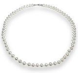 white high-grade pearls with sterling clasp strung on white silk.