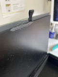 Close up of blemish on inside of armoire box.