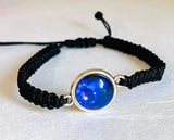 Galaxy Adjustable Bracelet, Galaxy Bracelet -nylon braided bracelet with glass cabochon and a blue galaxy print inside.