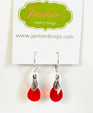 Red Crystal Drop Earrings on branded earrings card in white