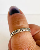 Pattern Ring, Stacking Ring, Textured Stacking Ring, dash dot pattern ring, sterling silver. Shown on thumb.