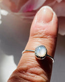 stacking Mother of Pearl Ring with thin sterling band.
